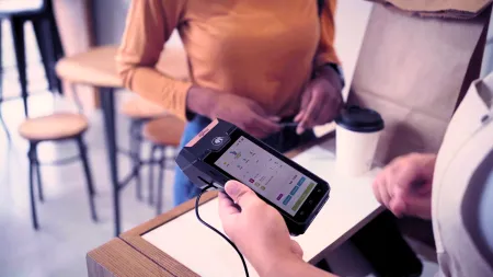 Ingenico Android AXIUM payment terminal in retail