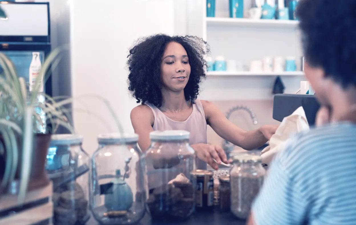 Lady behind counter_Coffee shop_Checkout.png